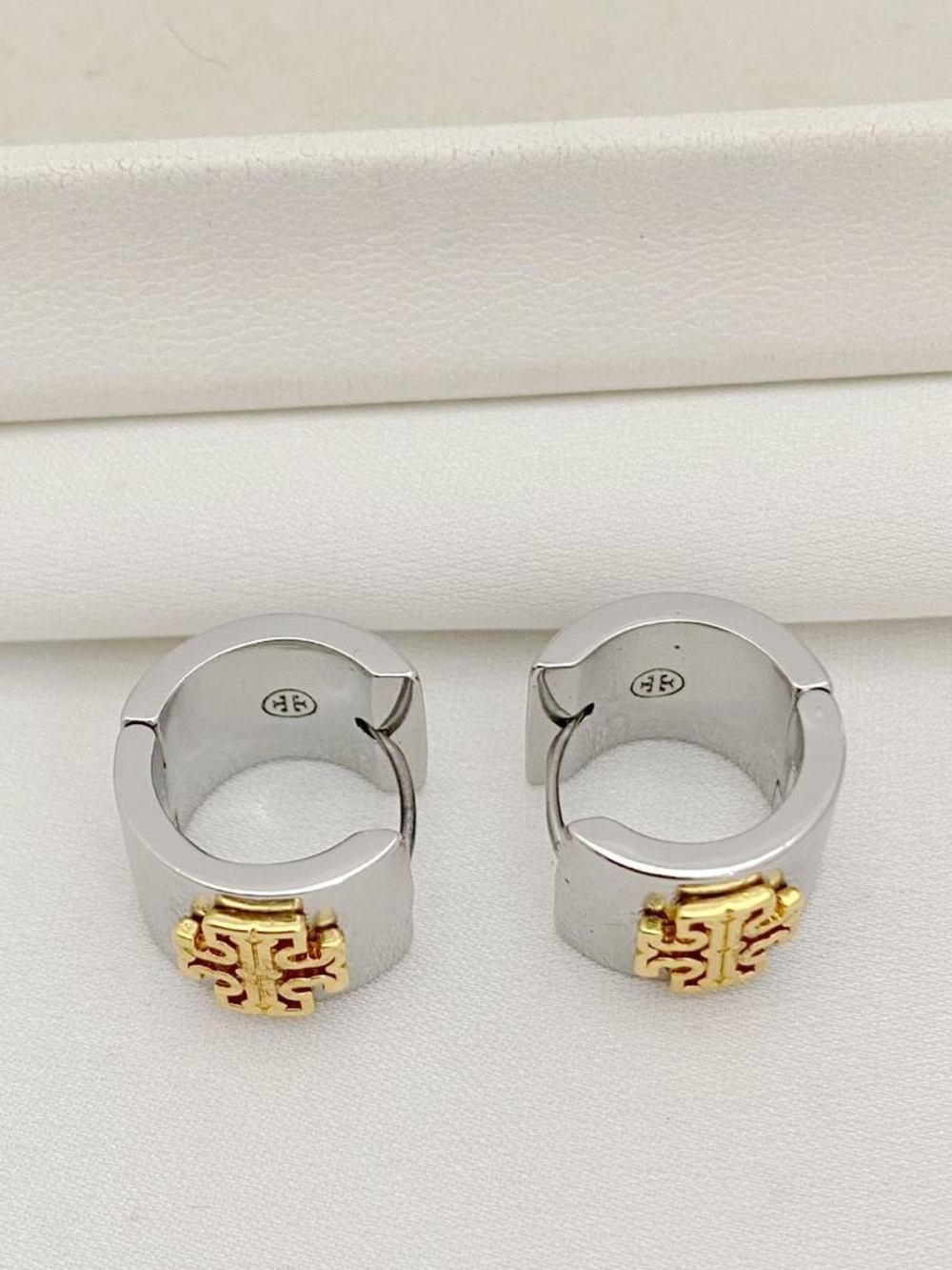Tory Burch Two-Tone Mini Hoop Earrings in Silver with Gold Logo - Picture 3 of 3